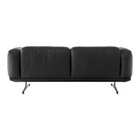 Elegant black leather sofa with smooth, minimalist design and sleek metal legs, perfect for contemporary decor.