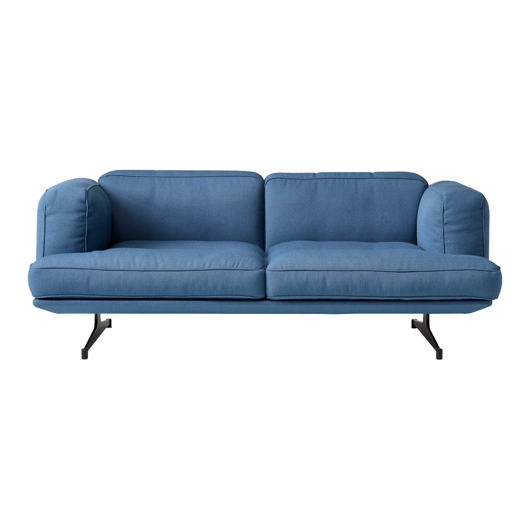 Stylish blue sofa with smooth fabric and minimalist black metal legs, perfect for modern living spaces.