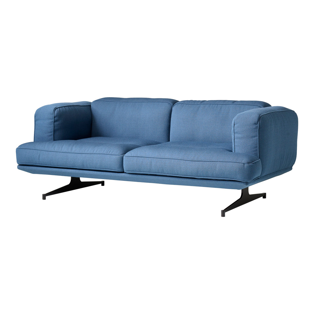 Blue fabric sofa with a minimalist design and sleek black metal legs, showcasing a solid color with a smooth texture.