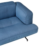 Blue cushioned sofa with a textured fabric and modern black metal legs. Perfect for contemporary living spaces.