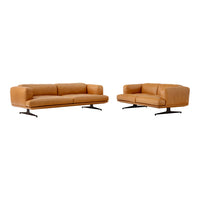 Tan leather sofa set with smooth texture and modern, minimal design on sleek black metal bases.