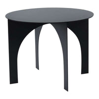 Round black table with sleek, minimalist design and arch-shaped legs, perfect for modern interiors.