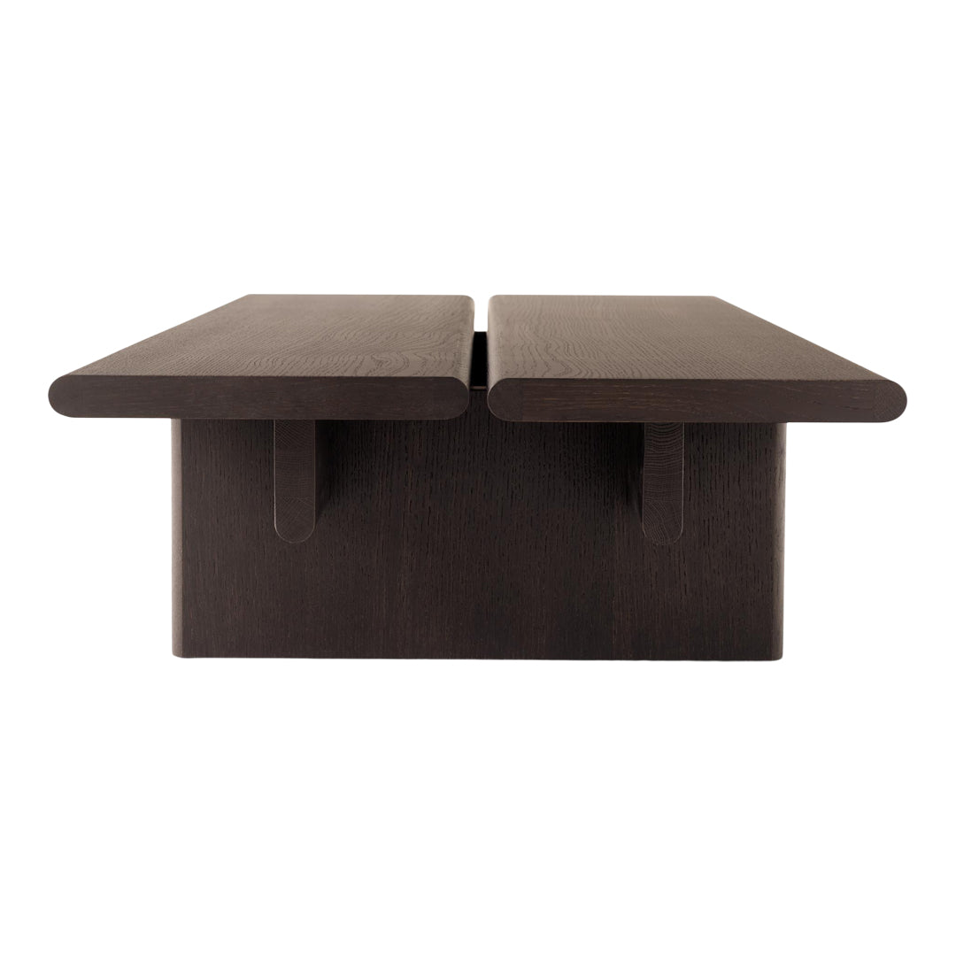 Dark brown wooden table with a sleek, minimalist design featuring smooth, rectangular surfaces.