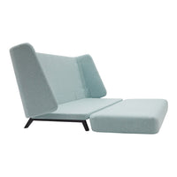 Light blue modern sofa with sleek lines and minimalistic design, featuring a solid black base for contrast.