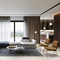Modern living room featuring gray and brown tones, soft textures, and a sleek patterned rug for a stylish look.