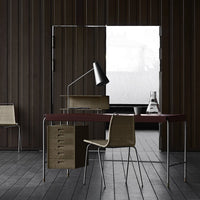Modern workspace featuring warm wood tones, sleek black accents, and subtle textured patterns in furniture design.