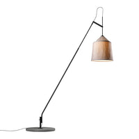 Black metal floor lamp with a copper-toned shade, featuring a modern minimalist design.