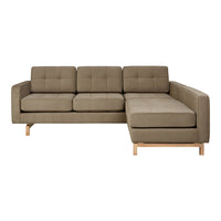 Beige sectional sofa with tufted upholstery and light wooden legs, featuring a modern, minimalist design.
