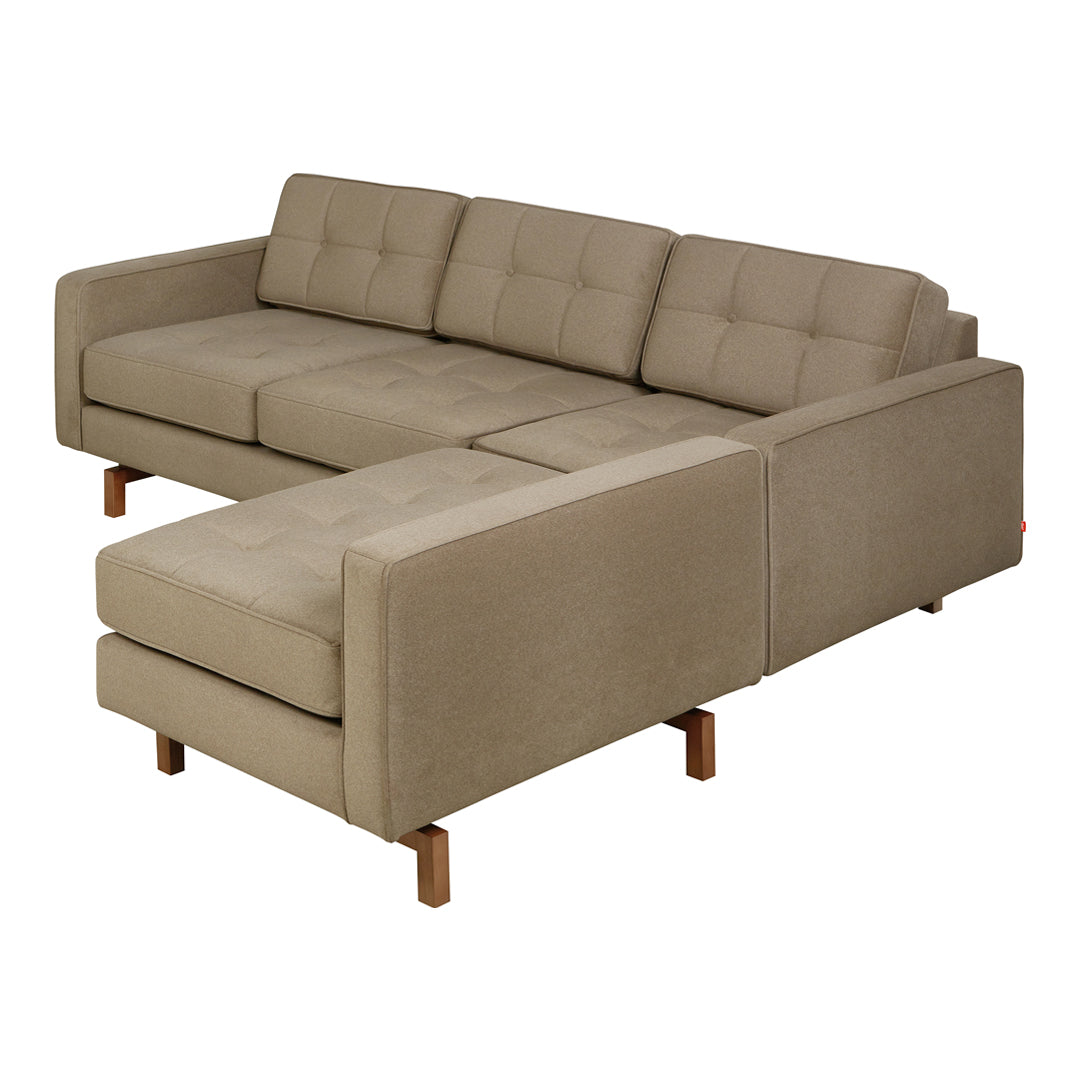 Beige tufted sectional sofa with clean lines and natural wood legs, perfect for modern living spaces.