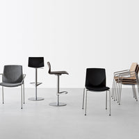 Modern chairs in black, gray, and beige with sleek metal legs, showcasing minimalist design and elegant patterns.