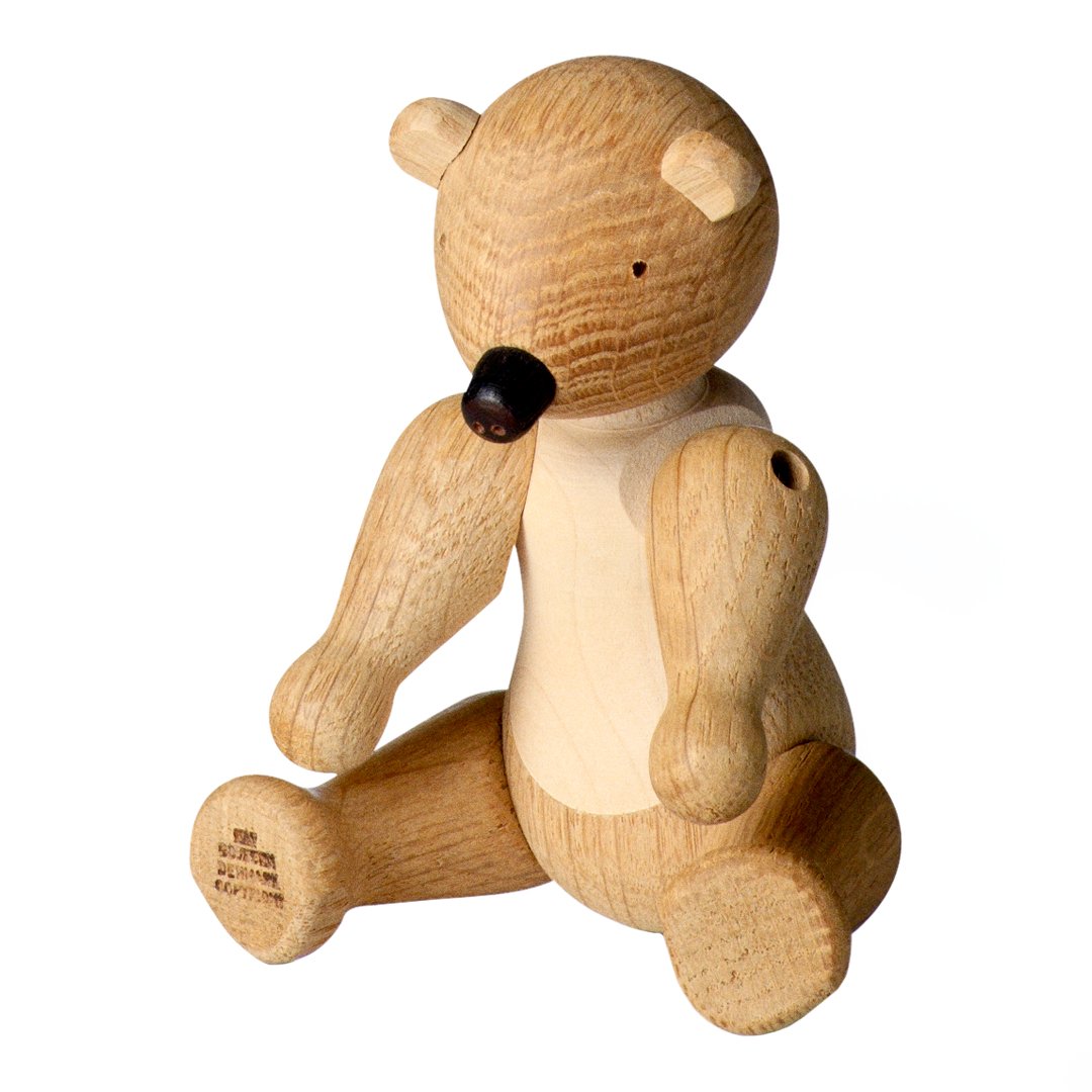 Wooden bear figurine in natural oak finish with smooth, light beige body and dark accents. Perfect for decor.