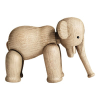 Natural wooden elephant toy in light oak finish, featuring smooth, rounded edges and a minimalist design.