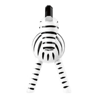 Black and white striped zebra toy with round body and sturdy legs, perfect for playful decor.