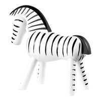 Black and white striped zebra figurine with sleek design and playful patterns. Perfect for decorative accents.