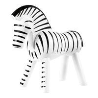 Black and white striped decorative zebra figurine with sleek, modern design and playful pattern.