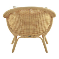 Natural rattan chair with a woven texture and light beige color, featuring a curved back and sturdy legs.
