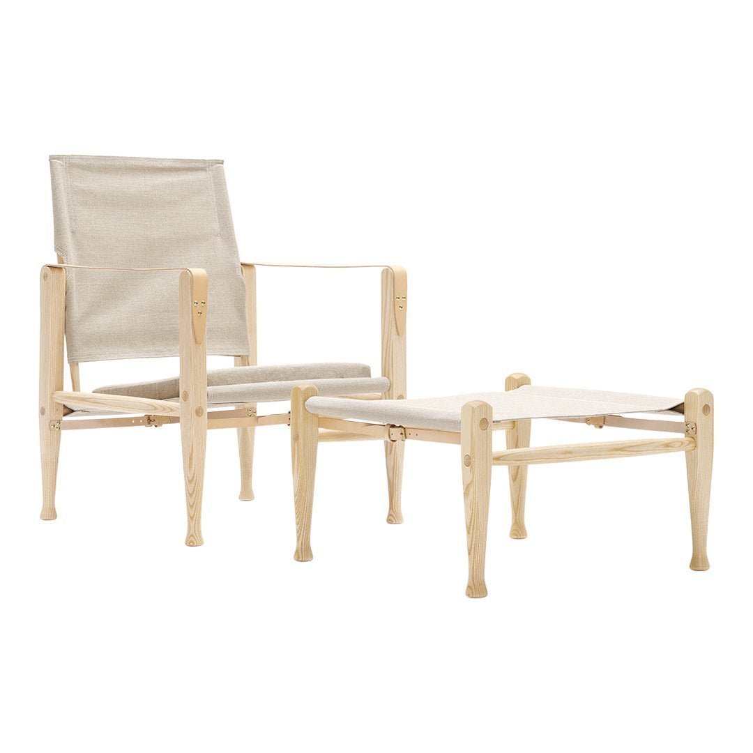 Light wood chair and ottoman set with a neutral, textured fabric in soft beige tones and minimalistic design.