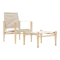 Light wood chair and ottoman set with a neutral, textured fabric in soft beige tones and minimalistic design.