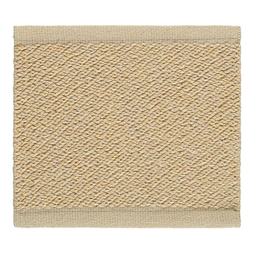 Beige textured rug with a diamond pattern and a solid border, ideal for elegant home decor.
