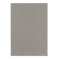 Gray textured fabric with a subtle pattern, perfect for versatile home decor and crafting projects.