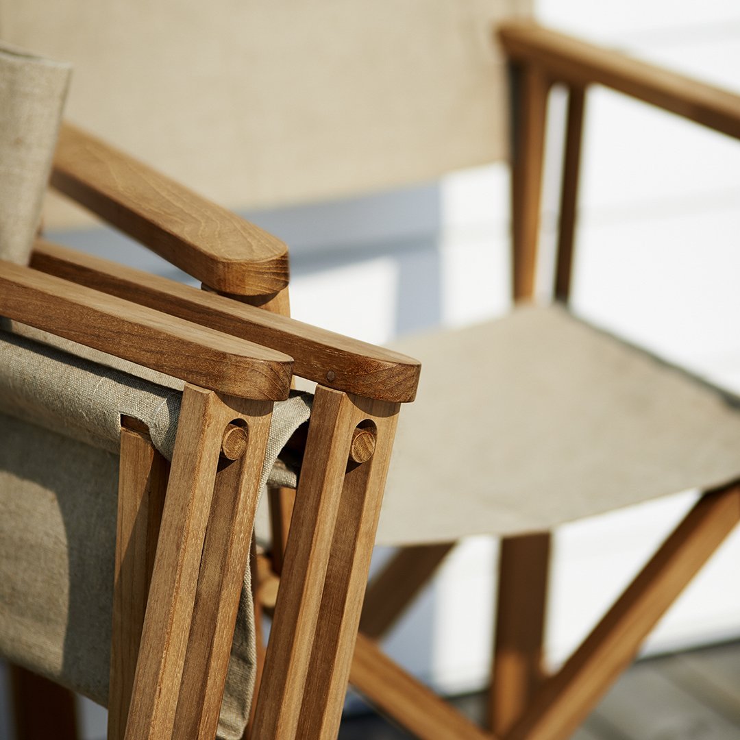 "Light beige fabric with a natural wooden frame, featuring a minimalist design and clean lines."
