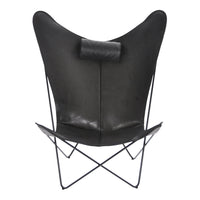 Black leather butterfly chair with a sleek, minimalist design and unique winged silhouette. Perfect for modern decor.