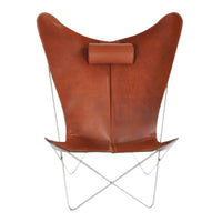 Brown leather butterfly chair with a smooth texture and minimalist silver frame, showcasing a sleek and modern design.