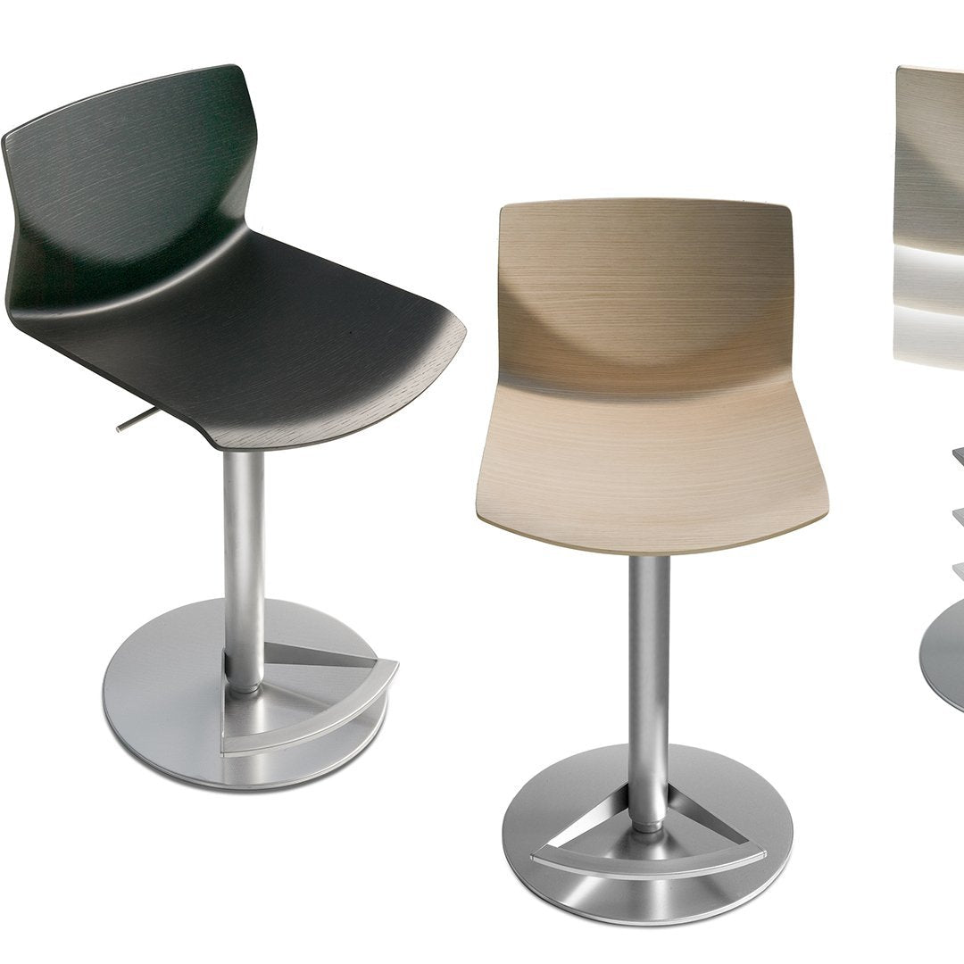 "Set of modern bar stools in black, green, and natural wood finishes with sleek metallic bases."