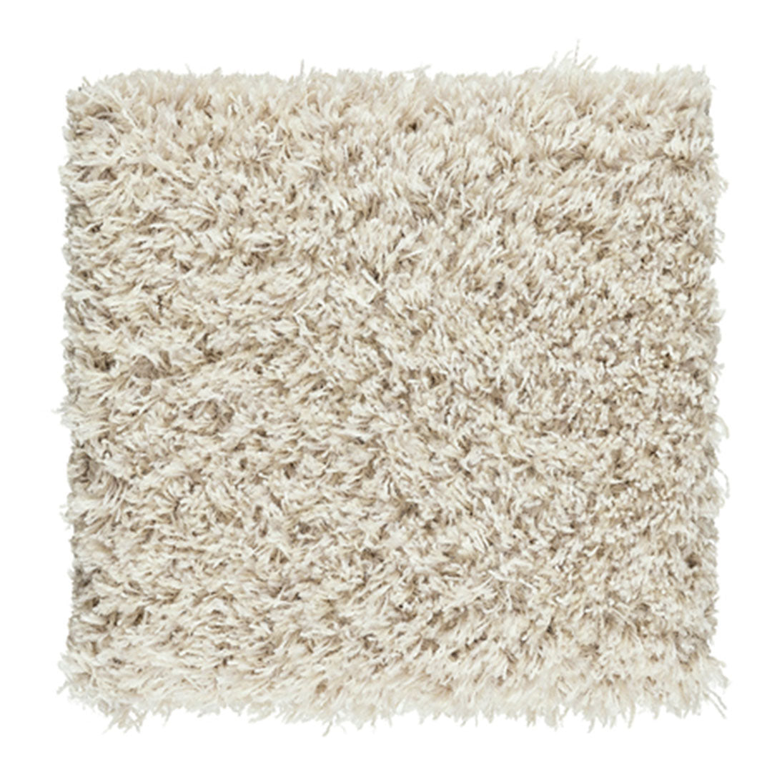 Cream plush square rug with soft, shaggy texture and no distinct pattern. Ideal for cozy home decor.