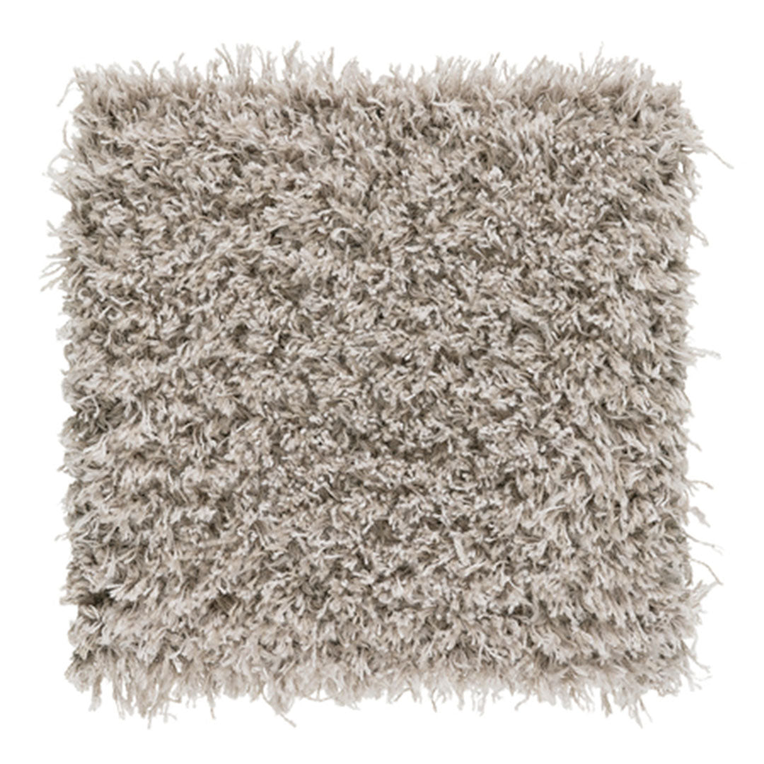 Beige shaggy square rug with a soft, textured surface and uneven, fluffy strands for a cozy, inviting look.