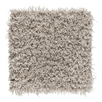 Beige shaggy square rug with a soft, textured surface and uneven, fluffy strands for a cozy, inviting look.