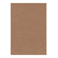 "Textured brown area rug featuring a subtle woven pattern, perfect for adding warmth to any space."