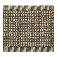 Brown and cream woven rug with a striped border, featuring a textured checkered pattern. Perfect for cozy decor.