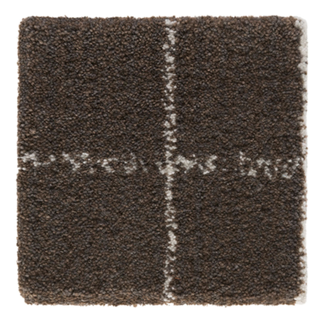 Brown textured rug with a subtle white striped pattern for modern decor. Soft, cozy, and stylish flooring option.