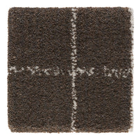 Brown textured rug with a subtle white striped pattern for modern decor. Soft, cozy, and stylish flooring option.