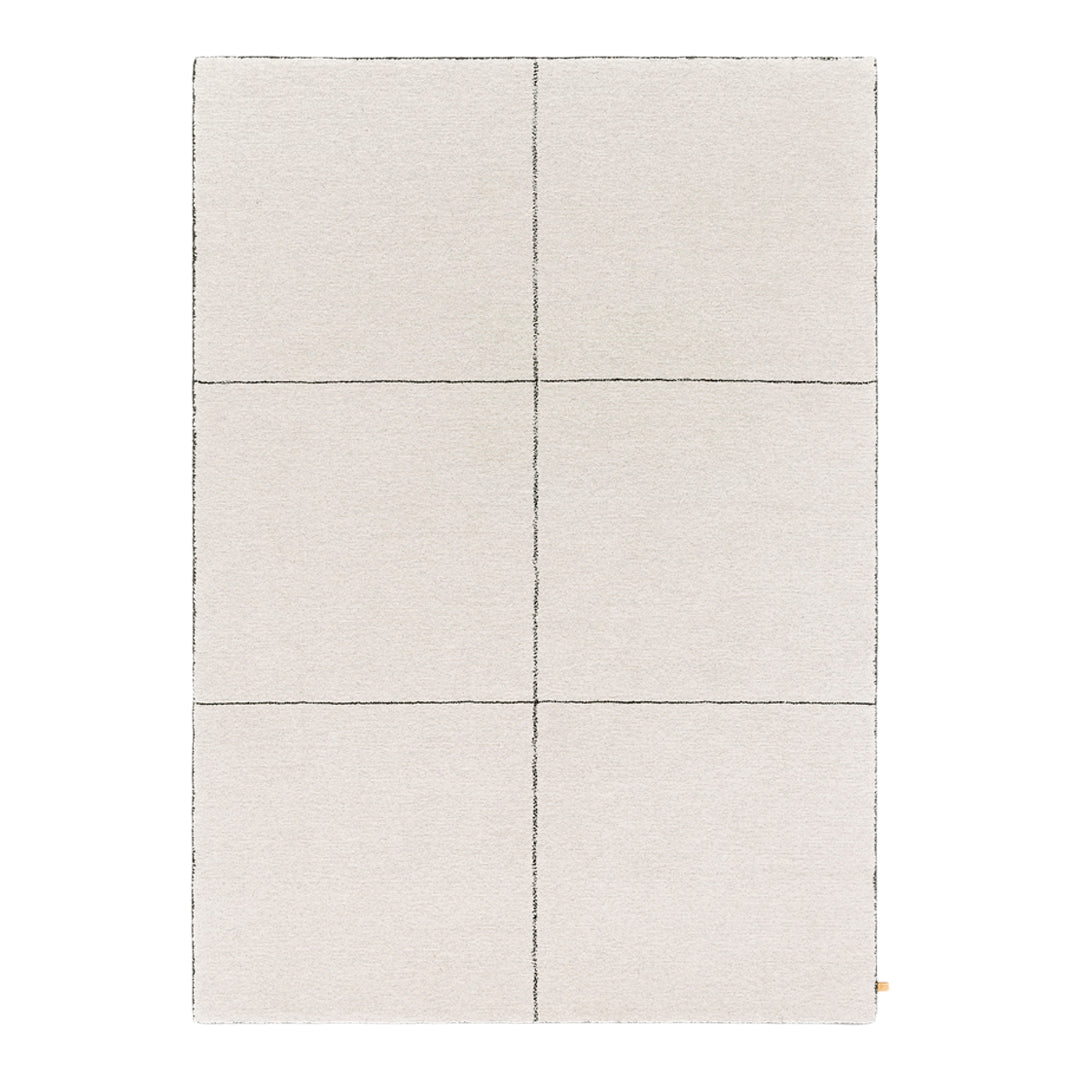 Light beige area rug with subtle gray grid pattern, ideal for modern decor.