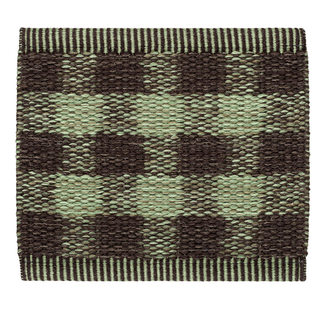 Green and brown checkered woven fabric, featuring a plaid pattern with alternating squares.
