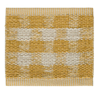 Yellow and cream patterned rug with a textured, woven design. Perfect for adding warmth to any space.
