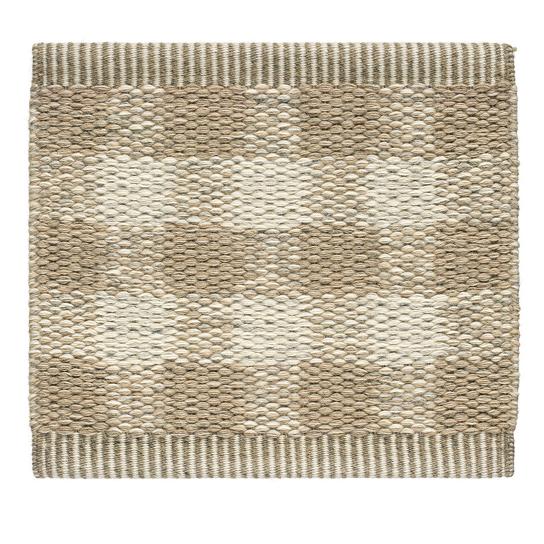 Textured beige rug with light cream and darker brown striped patterns, creating a warm, neutral aesthetic.