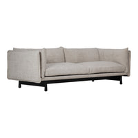 Light beige fabric sofa with a minimalistic design and clean lines, featuring a black metal frame.