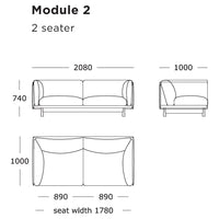 "Minimalist two-seater sofa design featuring soft lines and contemporary upholstery in warm neutral tones."