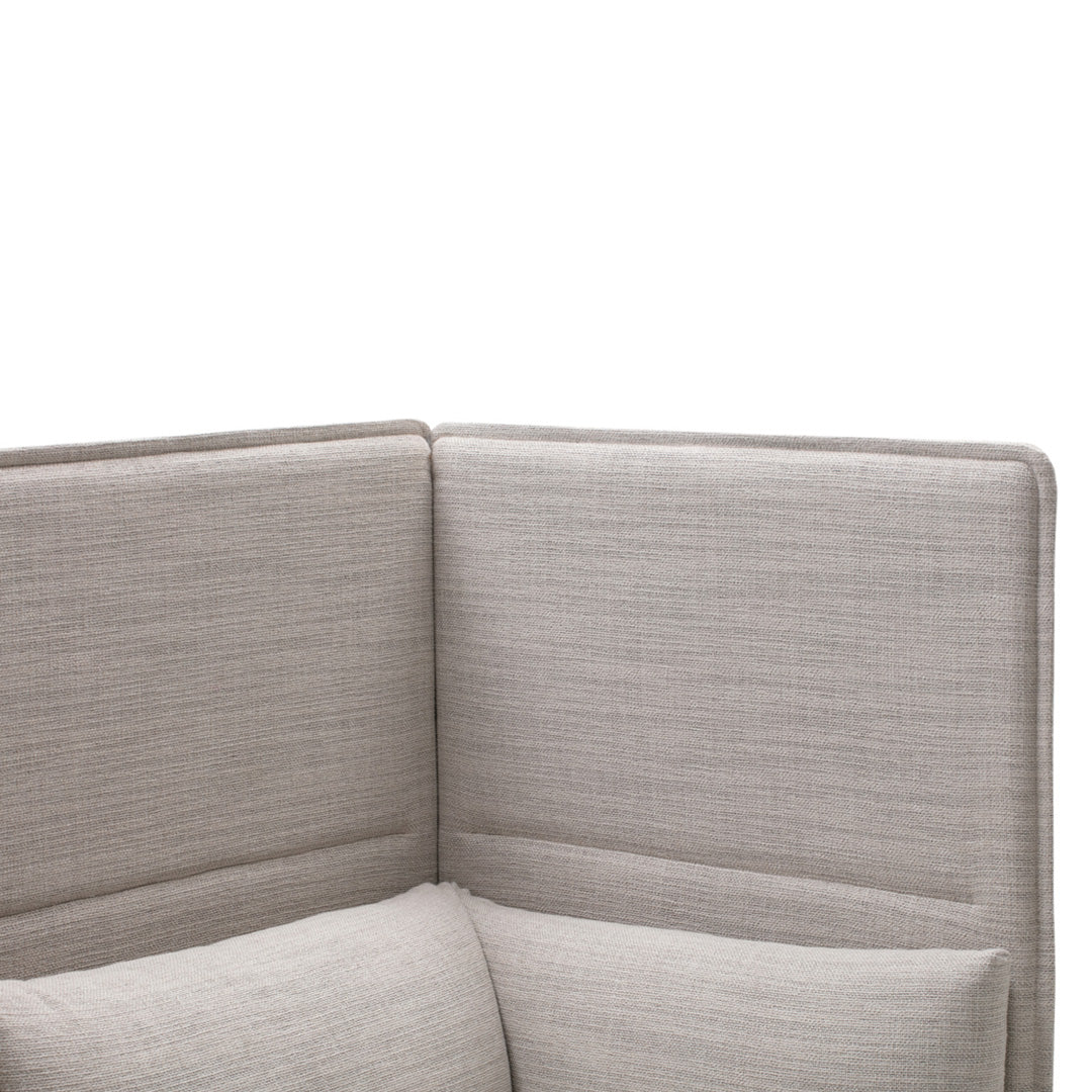 Light gray textured fabric with subtle woven pattern, featuring a sleek, modern design and soft cushions.