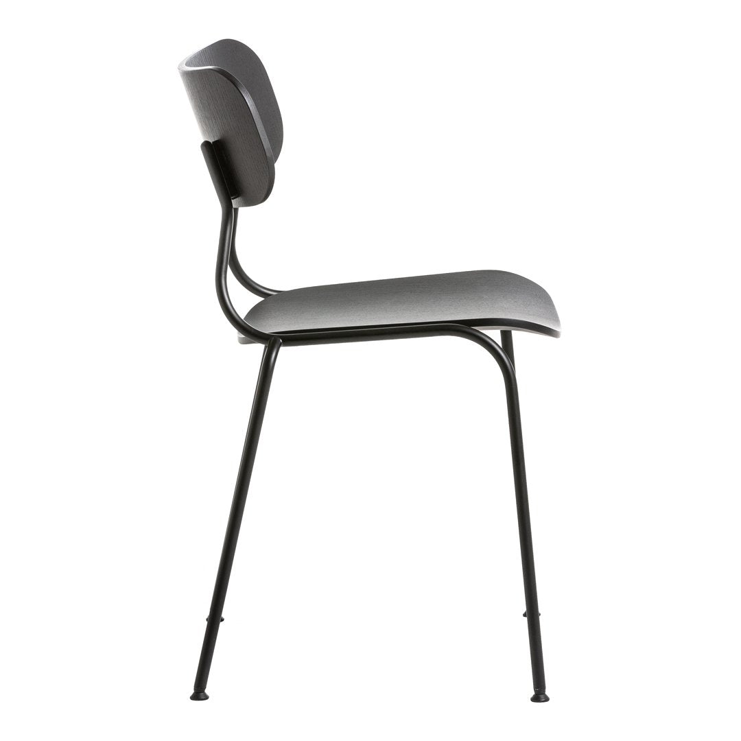 Gray upholstered chair with a sleek black metal frame, featuring a minimalist design and smooth contours.