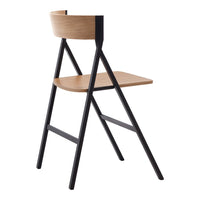 Modern chair with a light wood seat and backrest, complemented by a sleek black metal frame.