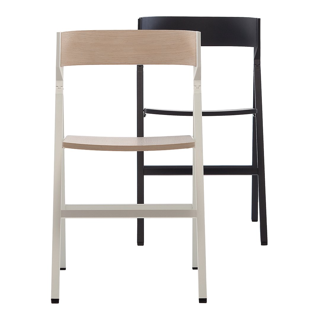 "Minimalist wooden chair in natural beige and sleek black finish, showcasing a simple, modern design."