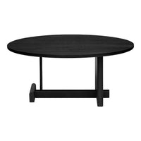 Sleek, round black coffee table with a minimalist design and smooth surface, ideal for modern decor.