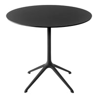 Round black table with a sleek matte finish and minimalist design, featuring a simple, modern silhouette.