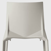Light gray minimalist chair with a smooth, matte finish and contemporary design. Perfect for modern interiors.