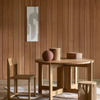 Warm wooden tones with soft geometric patterns in neutral colors, featuring earthy accents and a minimalist design.