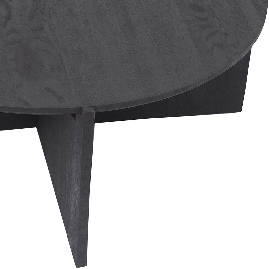 Round black wooden coffee table with a smooth finish and sleek geometric design.